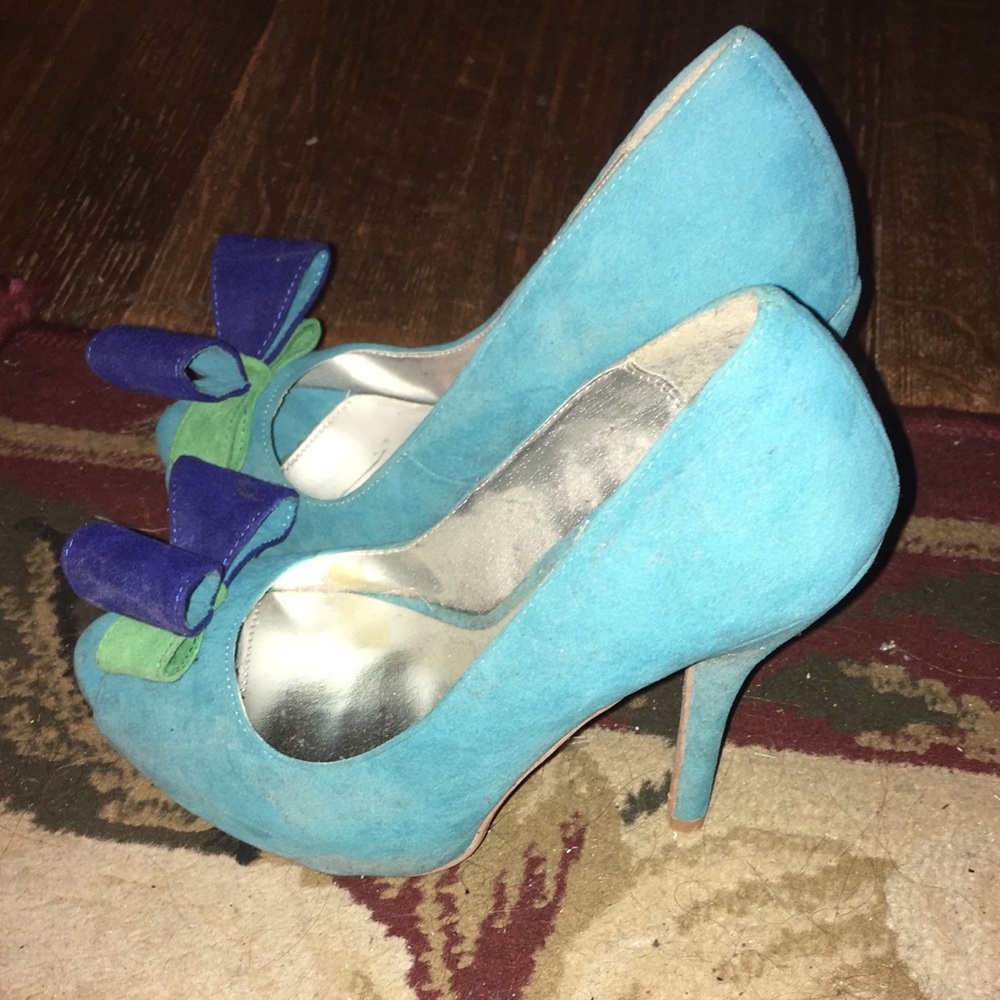 Peep toe suede heels